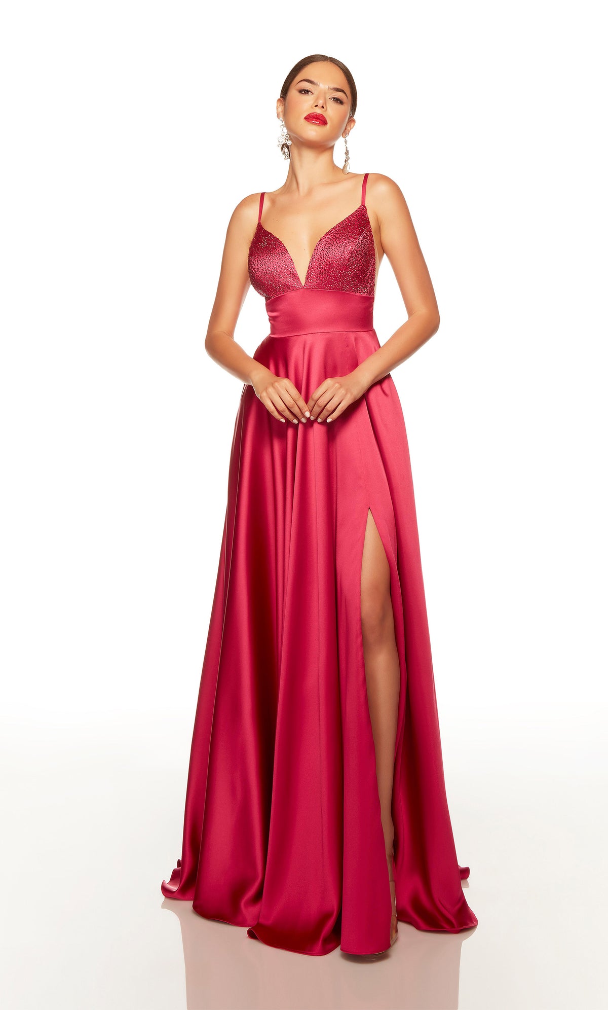 Fuchsia long formal dress with a V neckline, embellished upper bodice, and side slit.