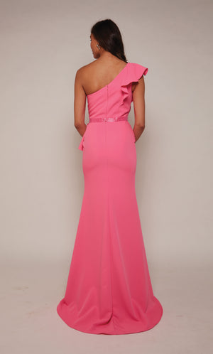 One shoulder ruffle dress with an zip up back, faux beaded belt, and train in bubblegum pink.