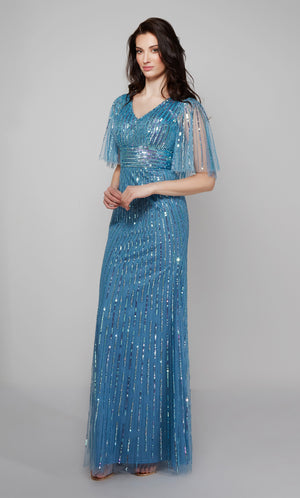 Sequin capelet gown with a V neck in blue.