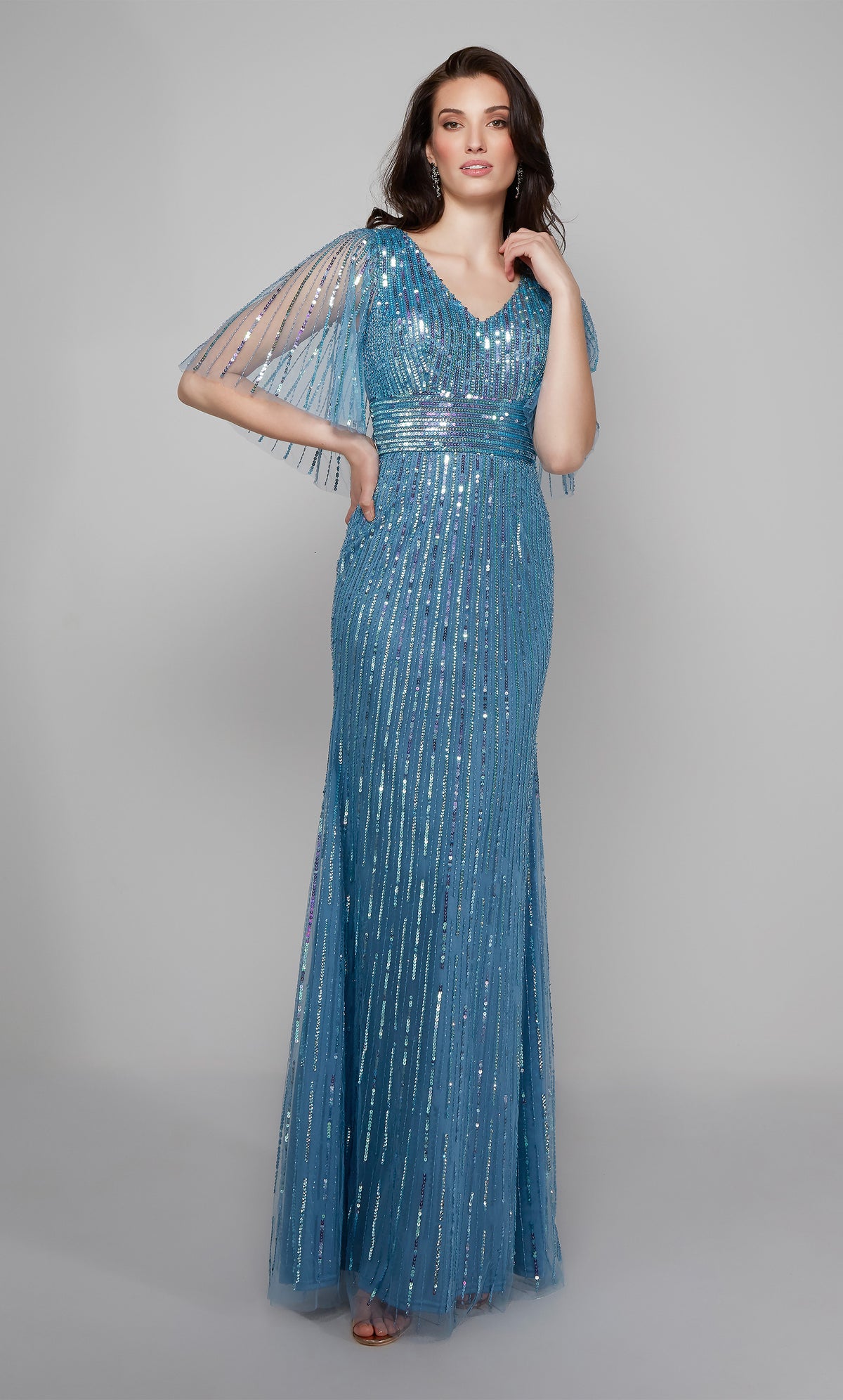 Sequin capelet dress with a V neck in blue.