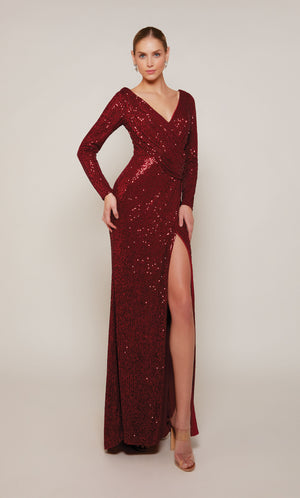 A long sleeve designer gown with a V-neckline, draped bodice, and side slit crafted from a rich wine colored sequin fabric.