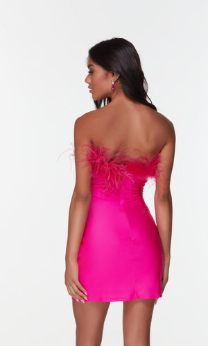 Hot pink bodycon dress with feather trim.