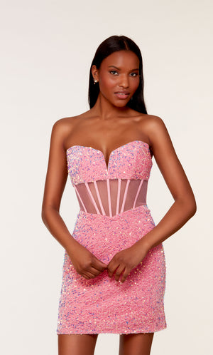 A glamorous corset top dress featuring a strapless sweetheart neckline and sheer bodice, in bubblegum pink colored plush sequins.