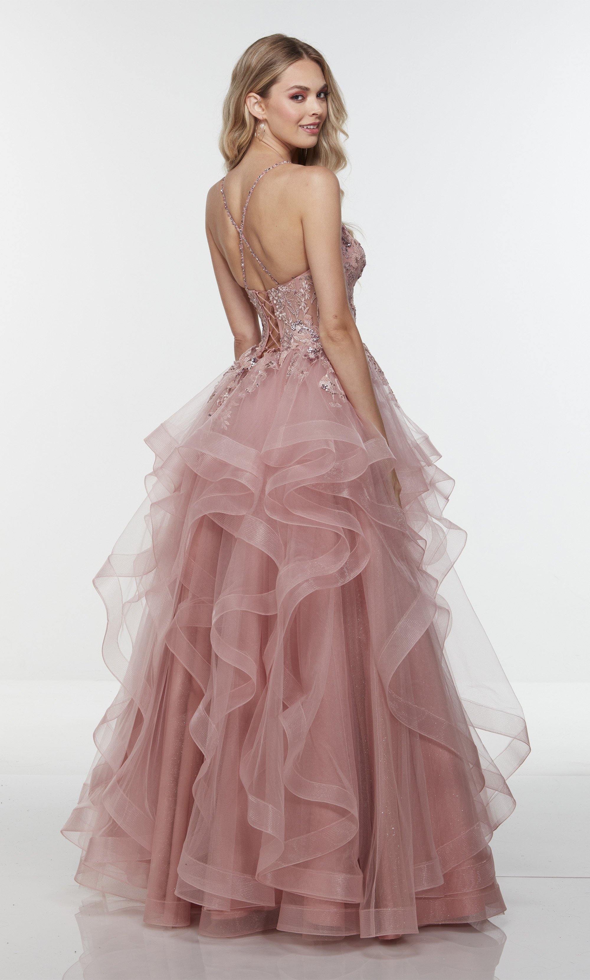 Layered tulle dress with a plunging neckline, sheer bodice, and lace appliques in pink.