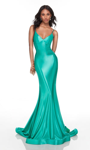 Emerald green long dress with a v neck, in a fit and flare silhouette.