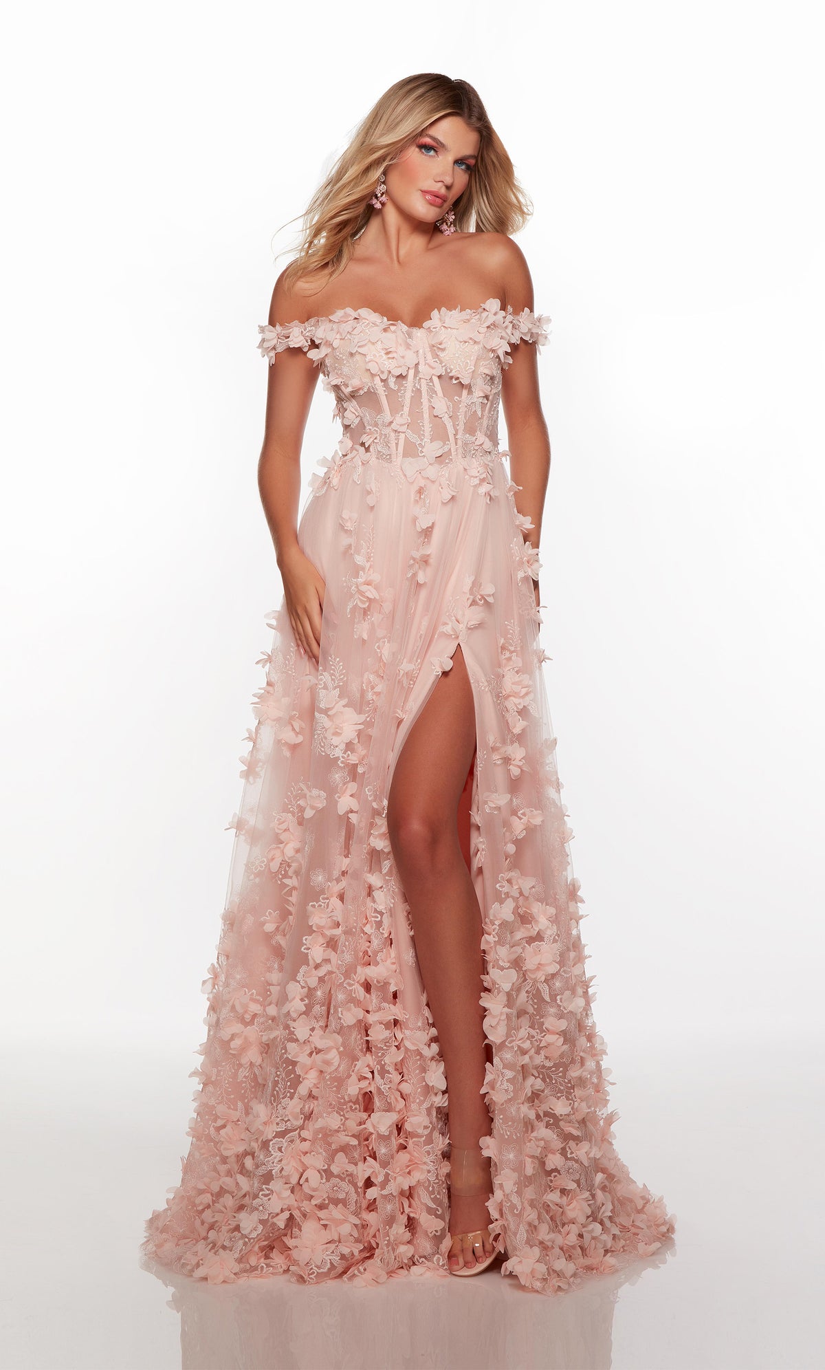 Light pink off the shoulder corset prom dress with a sheer lace up bodice and delicate 3d flowers throughout.