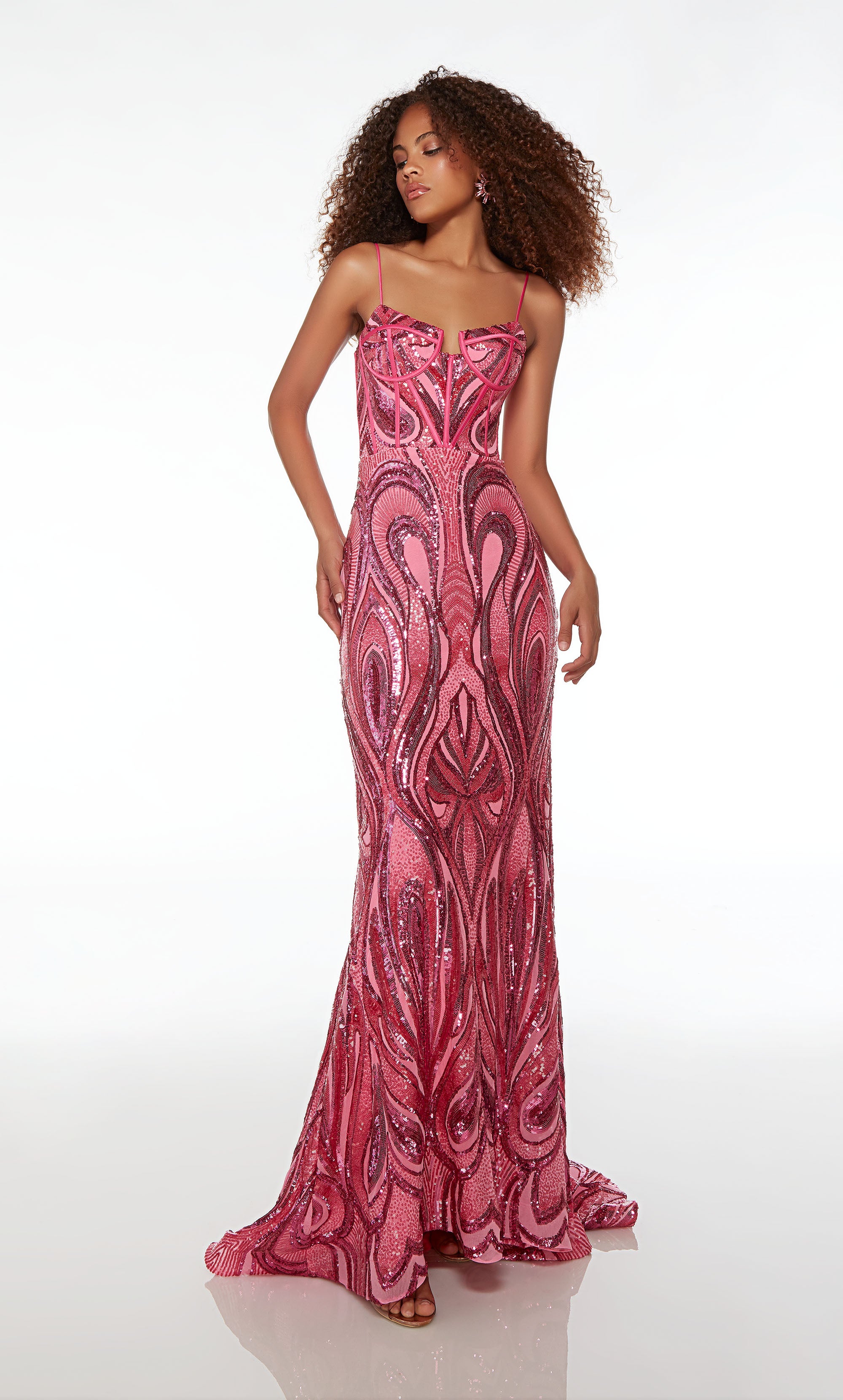 Unique fuchsia pink prom dress with an sweetheart neckline, corset top, lace-up back, and an long train adorned with intricate sequin designs for an truly one-of-a-kind ensemble.