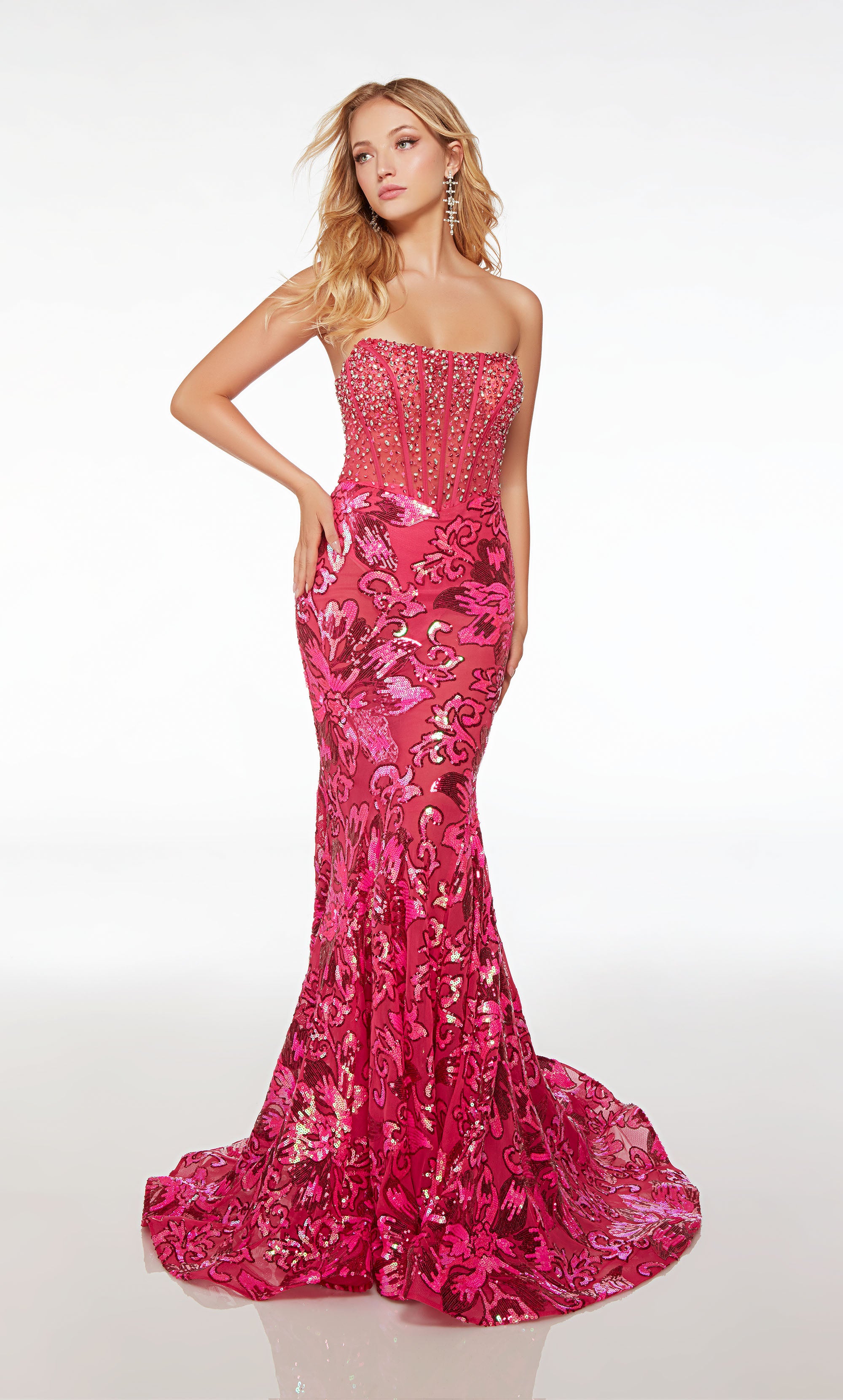 Stunning strapless mermaid dress featuring an sheer rhinestone-embellished corset top and an floral sequin skirt with an gracefully long train.