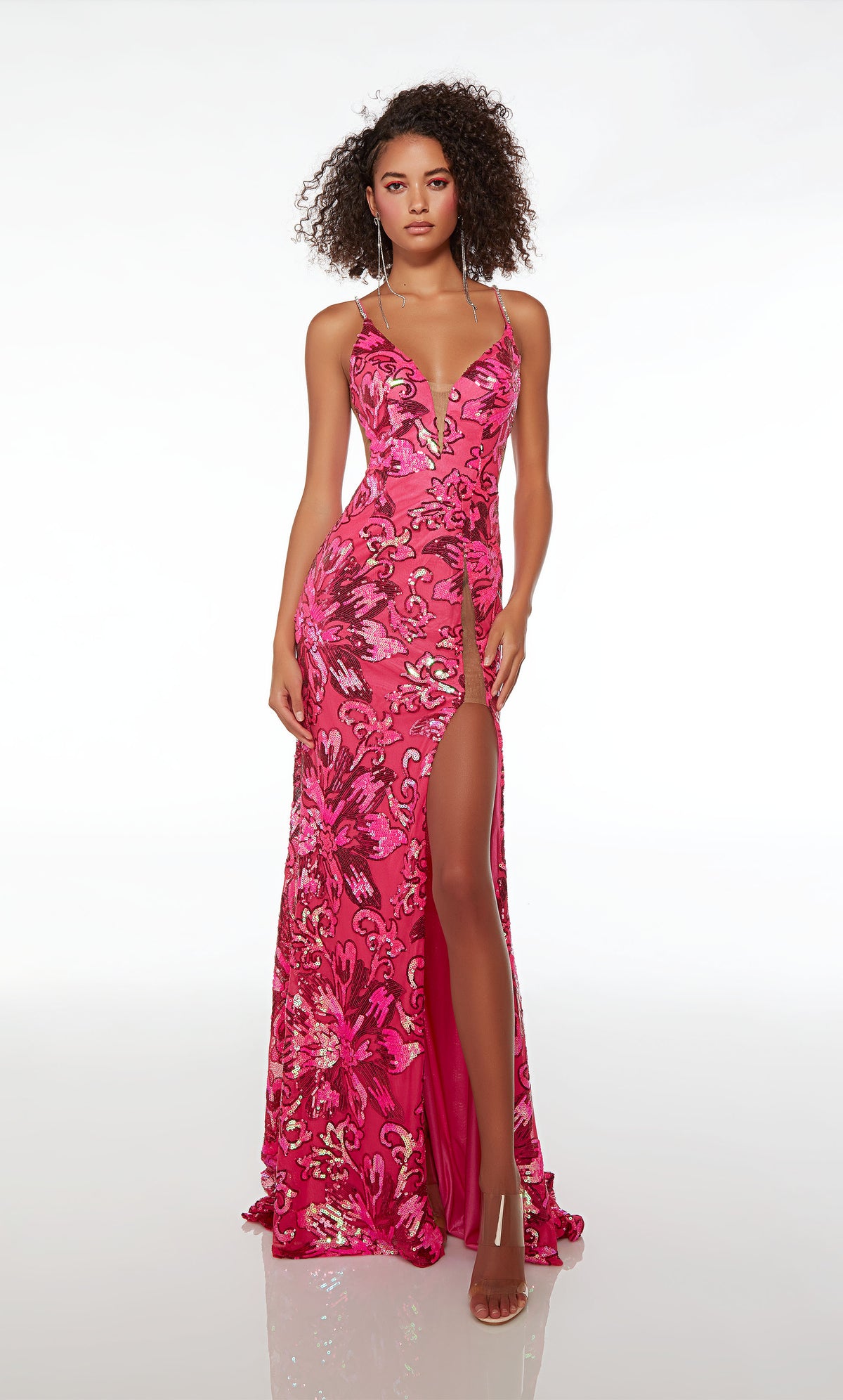 Pink mermaid dress, floral sequins, plunging neckline, high slit, crisscross back, stylish train—an captivating and glamorous ensemble.