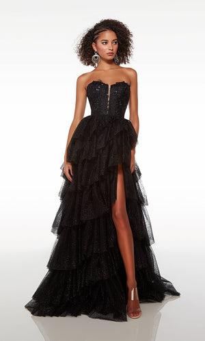 Chic black prom dress: strapless sweetheart neckline, high slit, zip-up back, slight train, and an glitter tulle ruffled skirt for an stunning look.