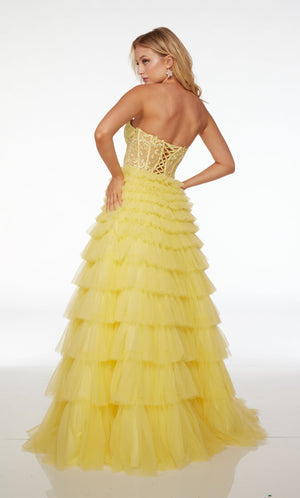 Dreamy yellow prom dress with an sheer lace strapless corset top and an tiered tulle skirt for an romantic and enchanting look.