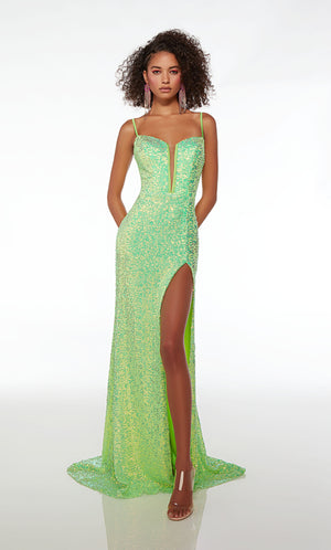 Green prom dress: form-fitting, plunging neckline, high slit, spaghetti straps, strappy open back, and an slight train in iridescent sequins.