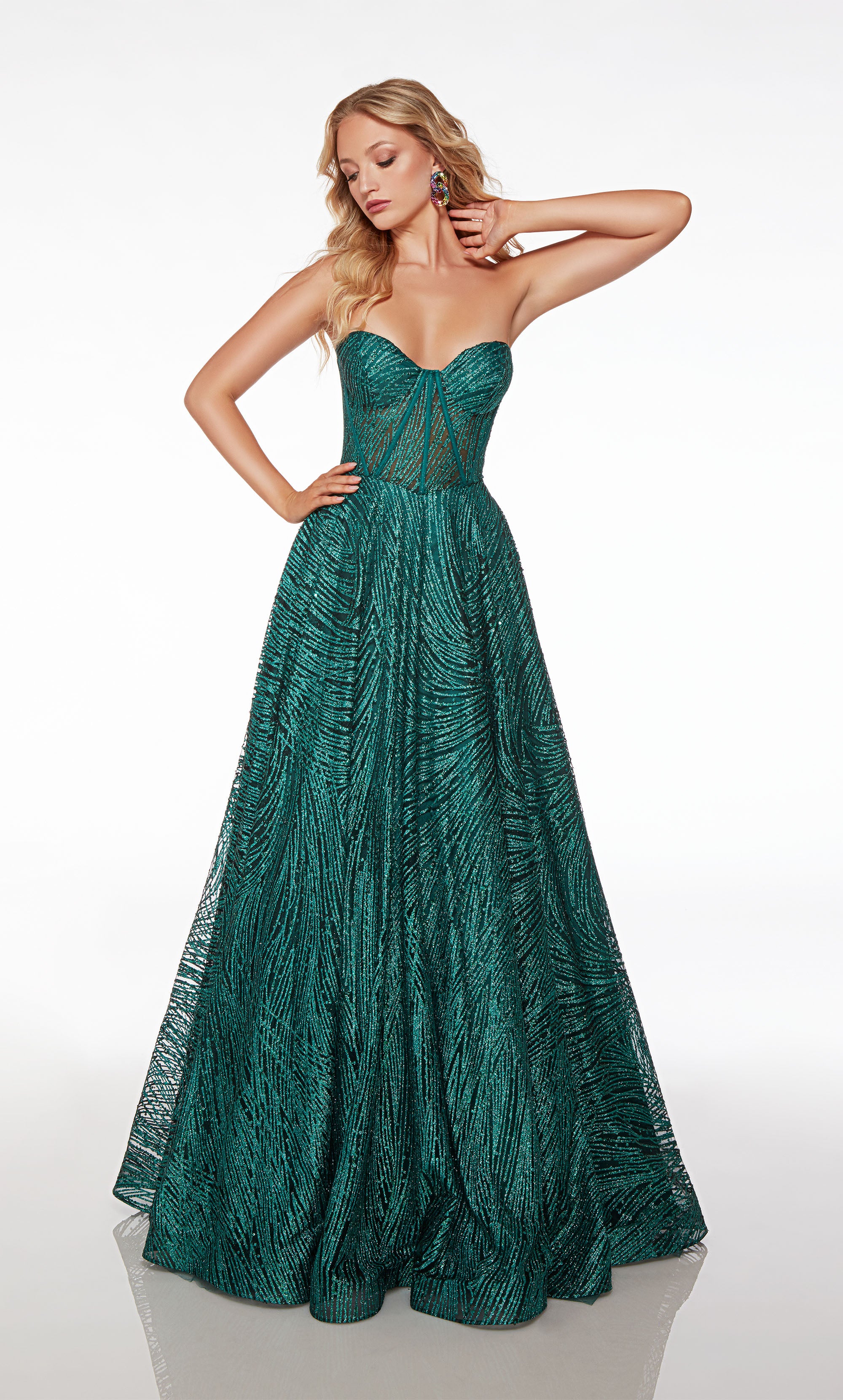 Strapless green corset dress with A-line skirt, lace-up back, and pockets, in stunning glitter tulle fabric for an chic and functional look.