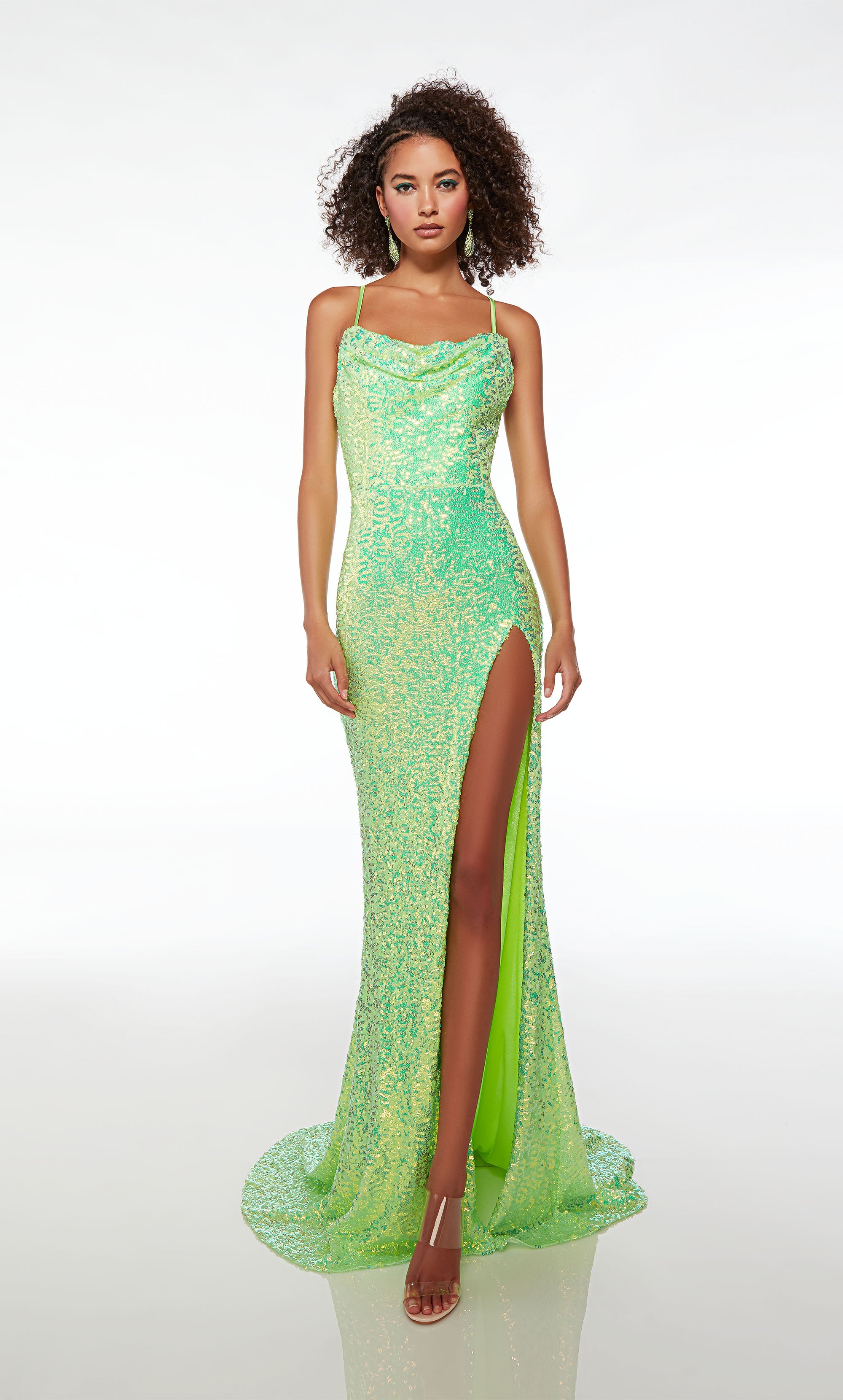 Light green sequin dress: cowl neck, spaghetti straps, high slit, crisscross lace-up back, ruching, and train—an stylish and enchanting ensemble.