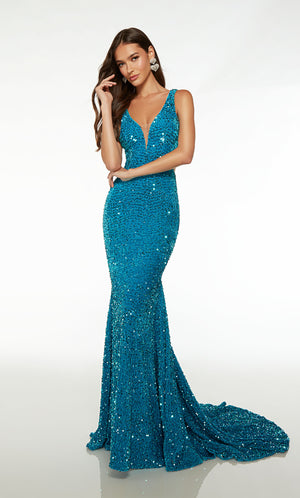 Gorgeous fit-and-flare designer dress in ocean blue plush sequins: plunging neckline, illusion side cutouts, V-shaped open back, and train.