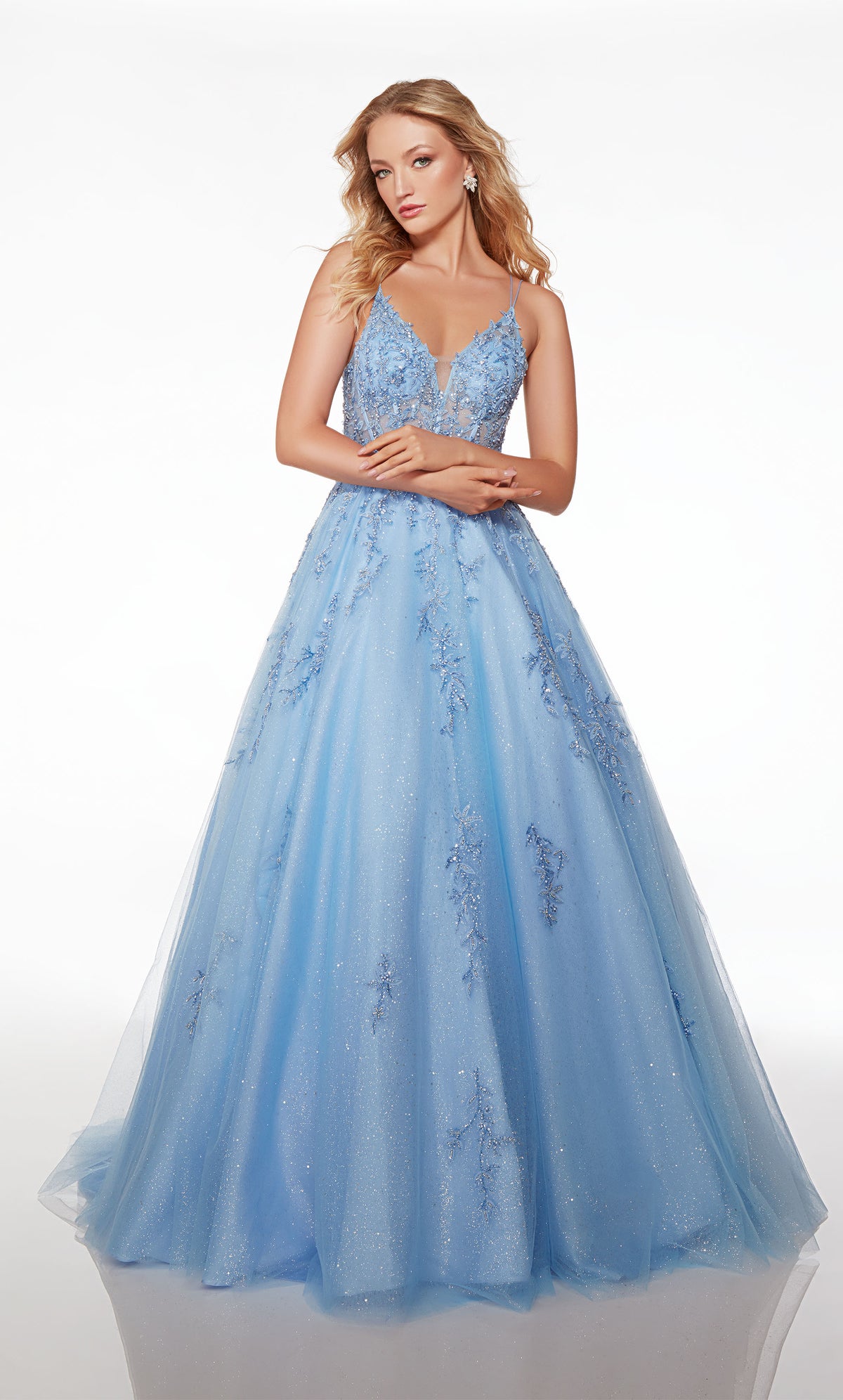 Cinderella-esque light blue glitter tulle ball gown: V neckline, sheer corset bodice, dual spaghetti straps, lace-up back, and beaded floral lace appliques.