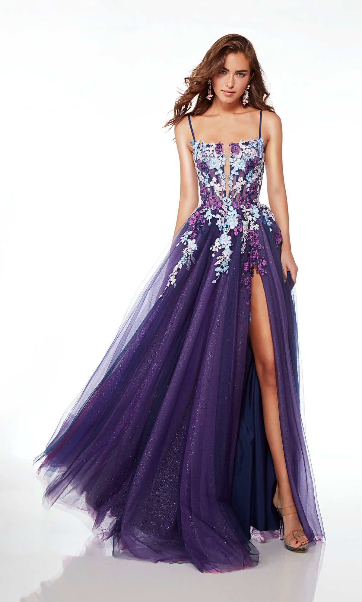 Purple-multi A-line tulle gown with an sheer corset bodice, high slit, spaghetti straps, lace-up back, slight train, and delicate floral lace appliques.