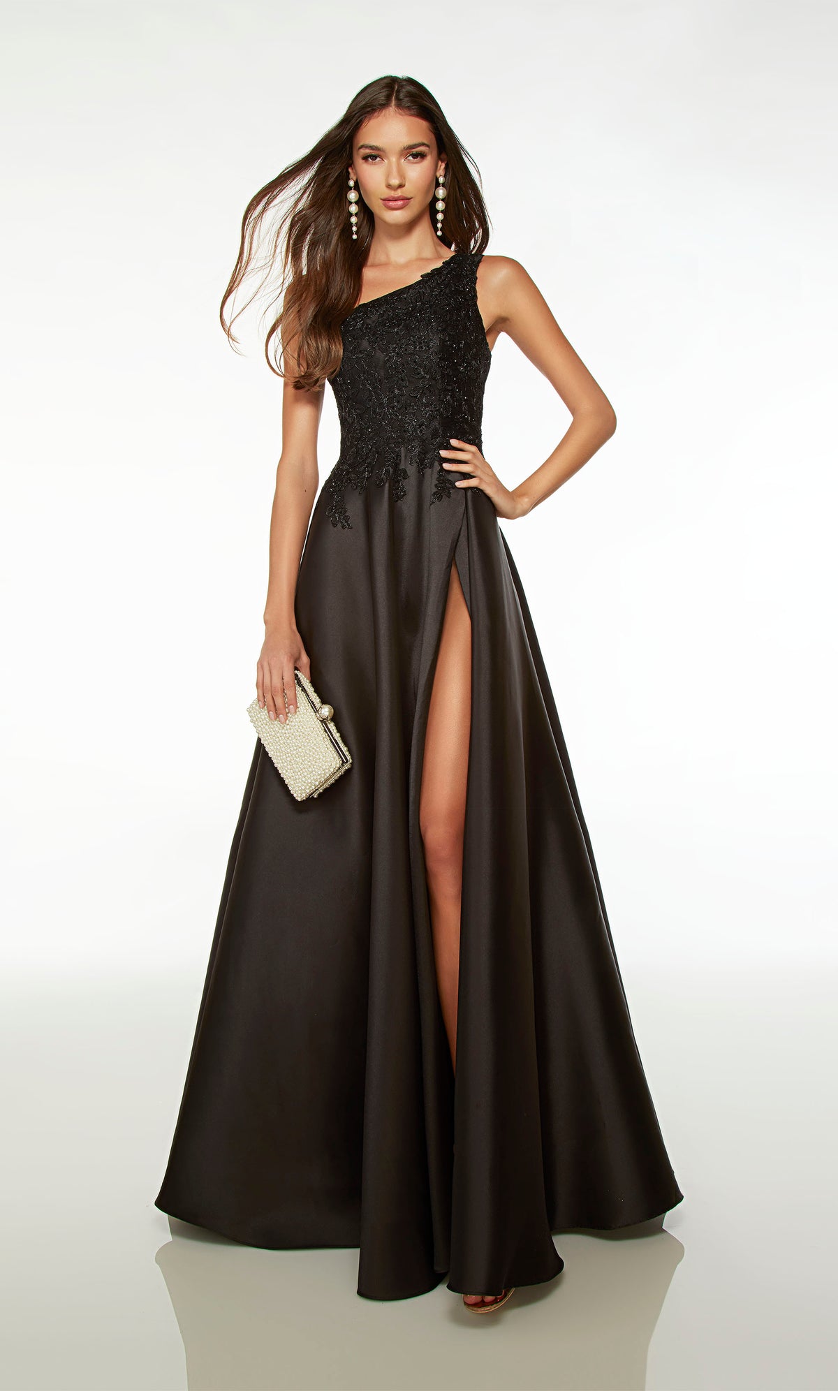 Elegant black prom dress: one-shoulder neckline, lace bodice, A-line mikado skirt with high slit, and an cutout back for an stylish touch.