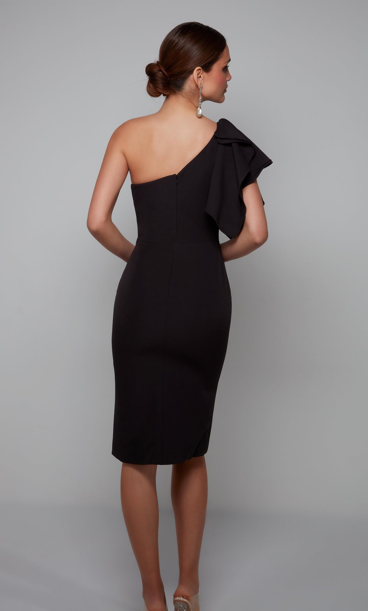 Chic one shoulder ruffle midi dress with a zip up back in black.