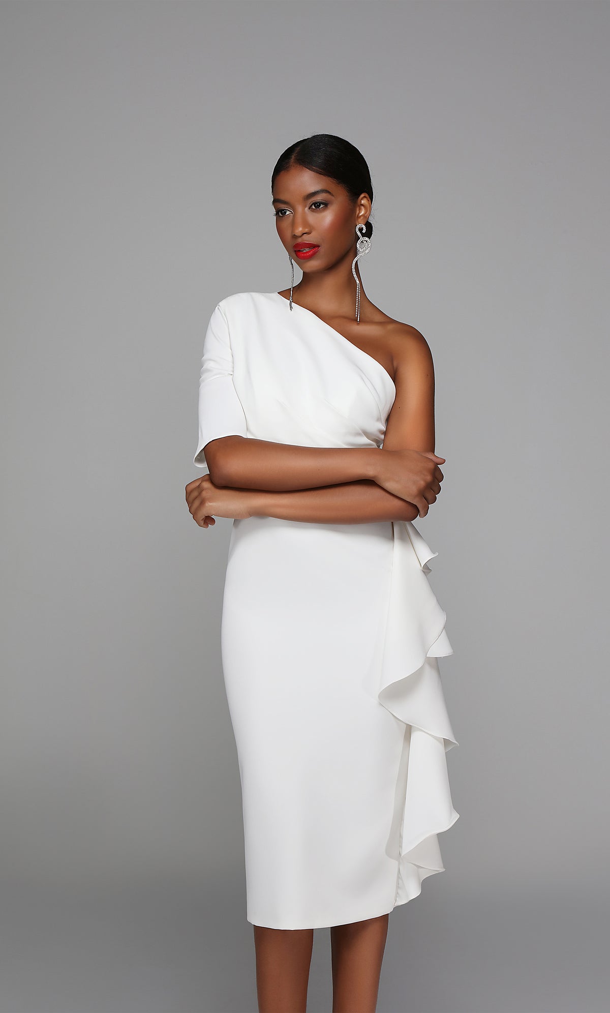 One shoulder midi dress with ruched bodice and side ruffle in white.