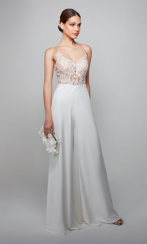 Ivory lace wedding jumpsuit with a sheer V neck bodice.