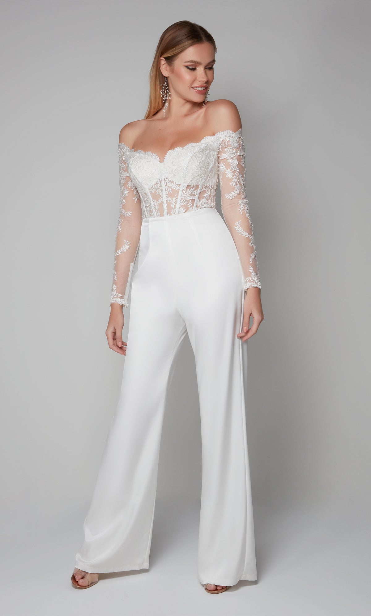 White bridal jumpsuit with a sheer lace off the shoulder corset bodice and long sleeves. Color-SWATCH_70018__DIAMOND-WHITE