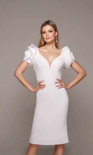 White midi dress with rose shaped sleeves and a plunging neckline.