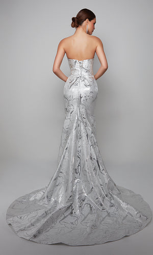 Fit and flare strapless jacquard wedding gown with a lace up back and train in ivory-silver.