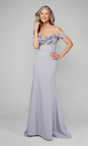 Ice blue fit and flare evening dress featuring an off the shoulder bodice enhanced with a beautiful flower volant.