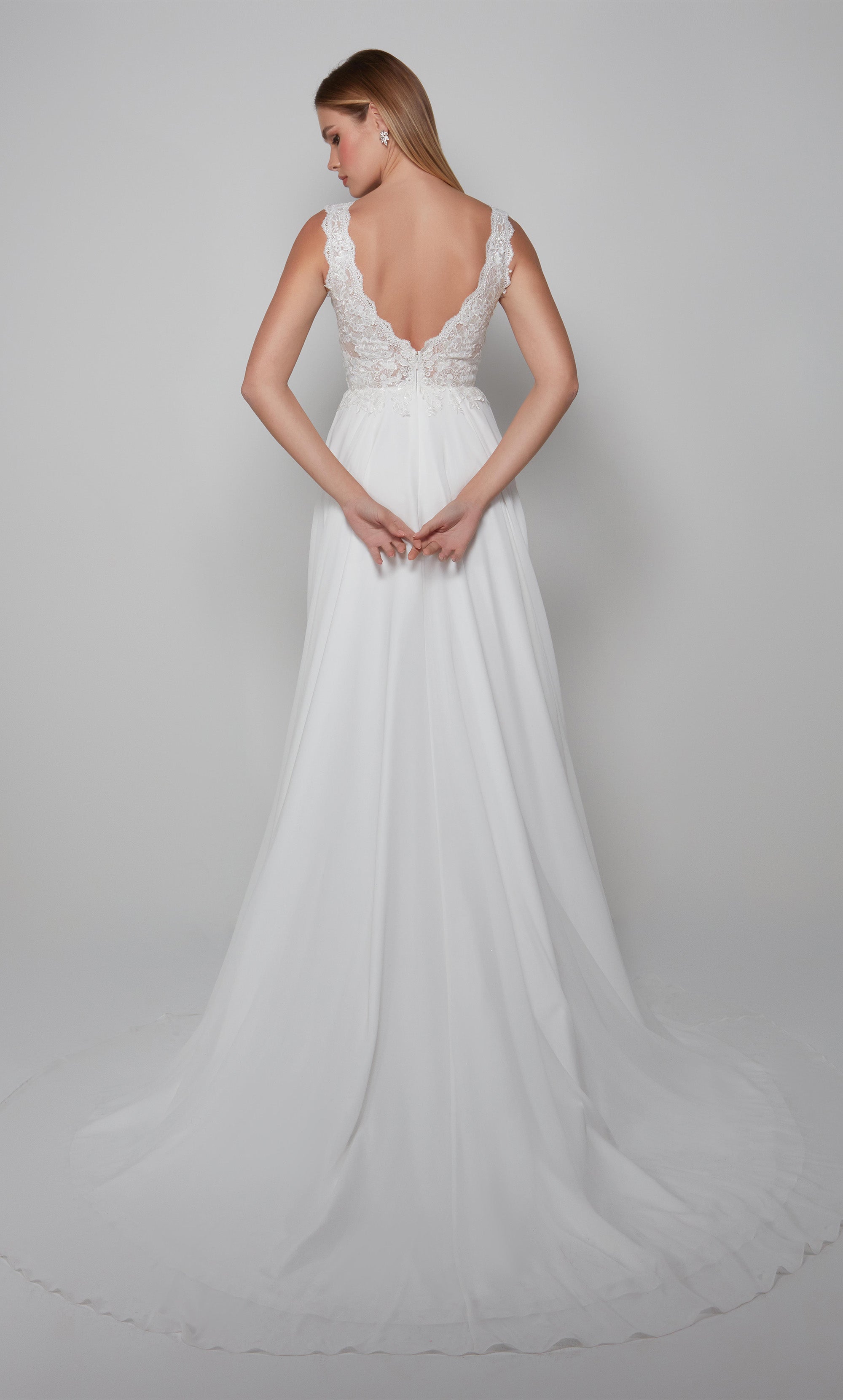 Sleeveless chiffon wedding dress with an elegant lace bodice in ivory. Color-SWATCH_7071__IVORY