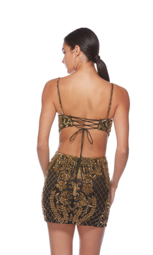 Striking black and gold hand-beaded mini dress featuring an V neckline, strappy lace up back, and captivating paisley-patterned design for an glamorous and stylish look.